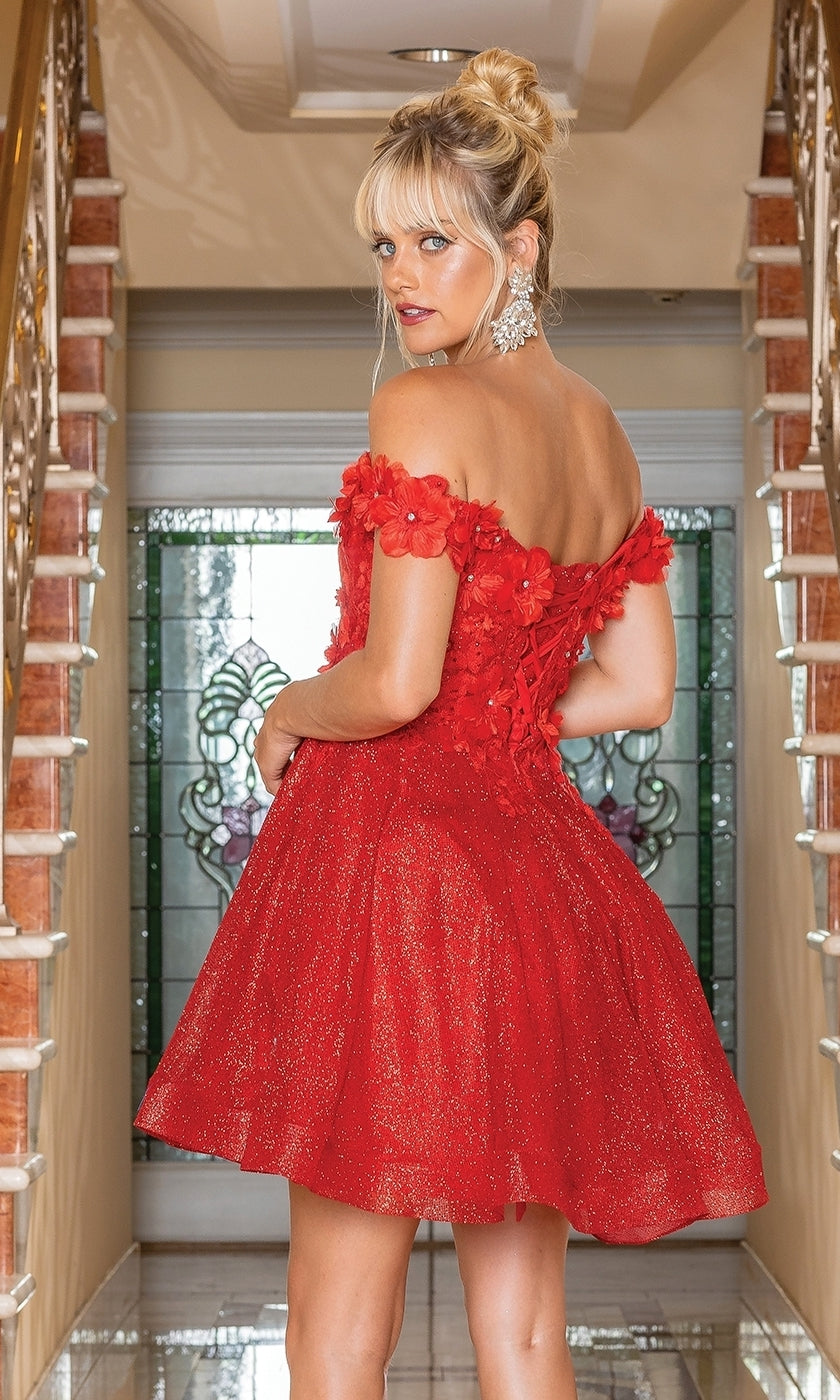 A woman in an affordable short, metallic Corset-Back Babydoll Prom Dress stands on a staircase, looking over her shoulder.